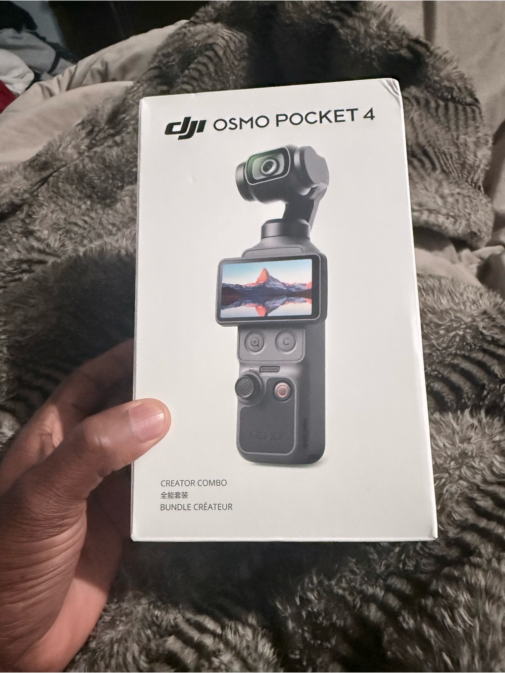 DJI Osmo Pocket 4 - White Box with Black Gimbal Image